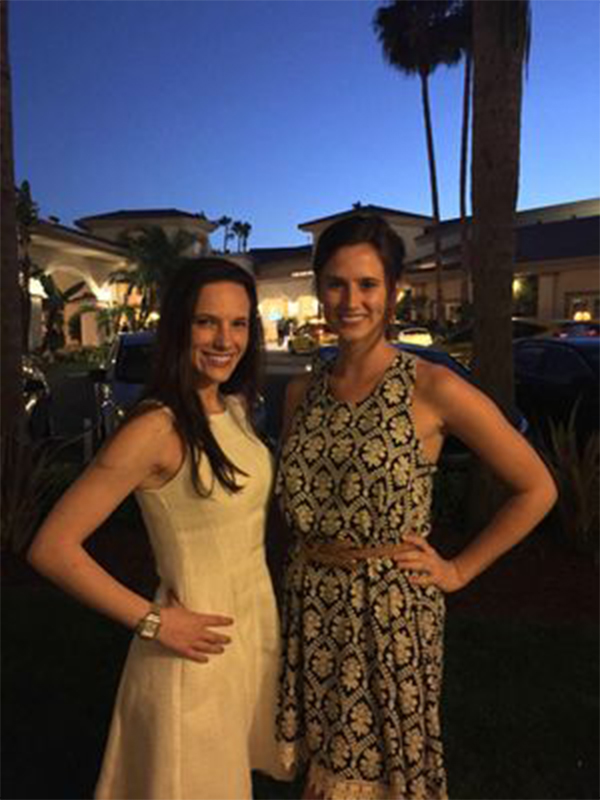 Two females with their arms around each other smiling for the camera at the Society of Pediatric Psychology Annual Conference
