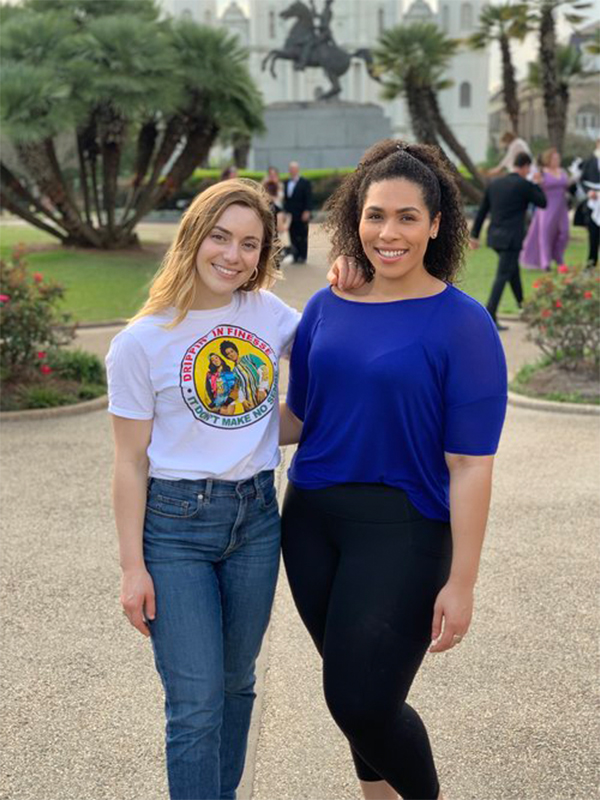 Two female students smiling at camera at the Society of Pediatric Psychology Annual Conference