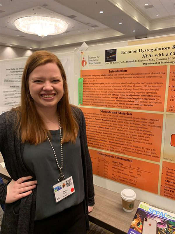 Female student and her poster at the Society of Pediatric Psychology Annual Conference