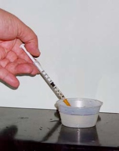 Applying US using syringe