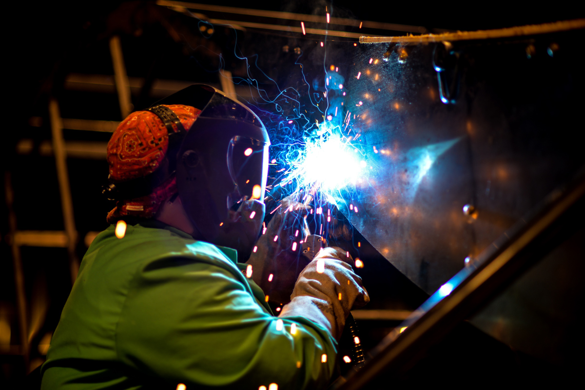 design and tech student welds on a prop for a set piece design and tech student welds on a prop for a set piecet